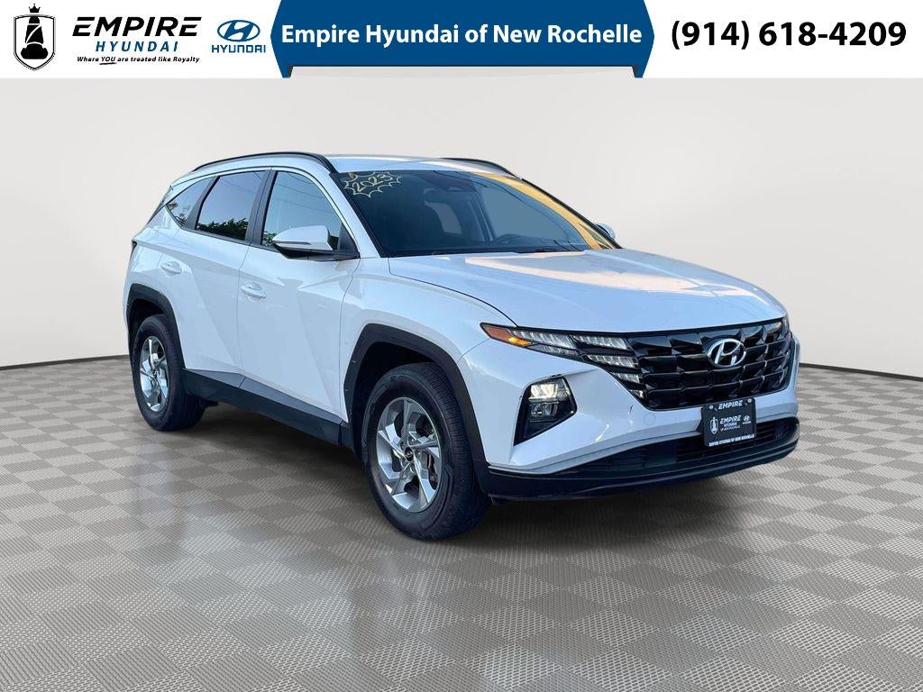 2023 Hyundai Tucson SEL in Serenity White Pearl — front three-quarter view