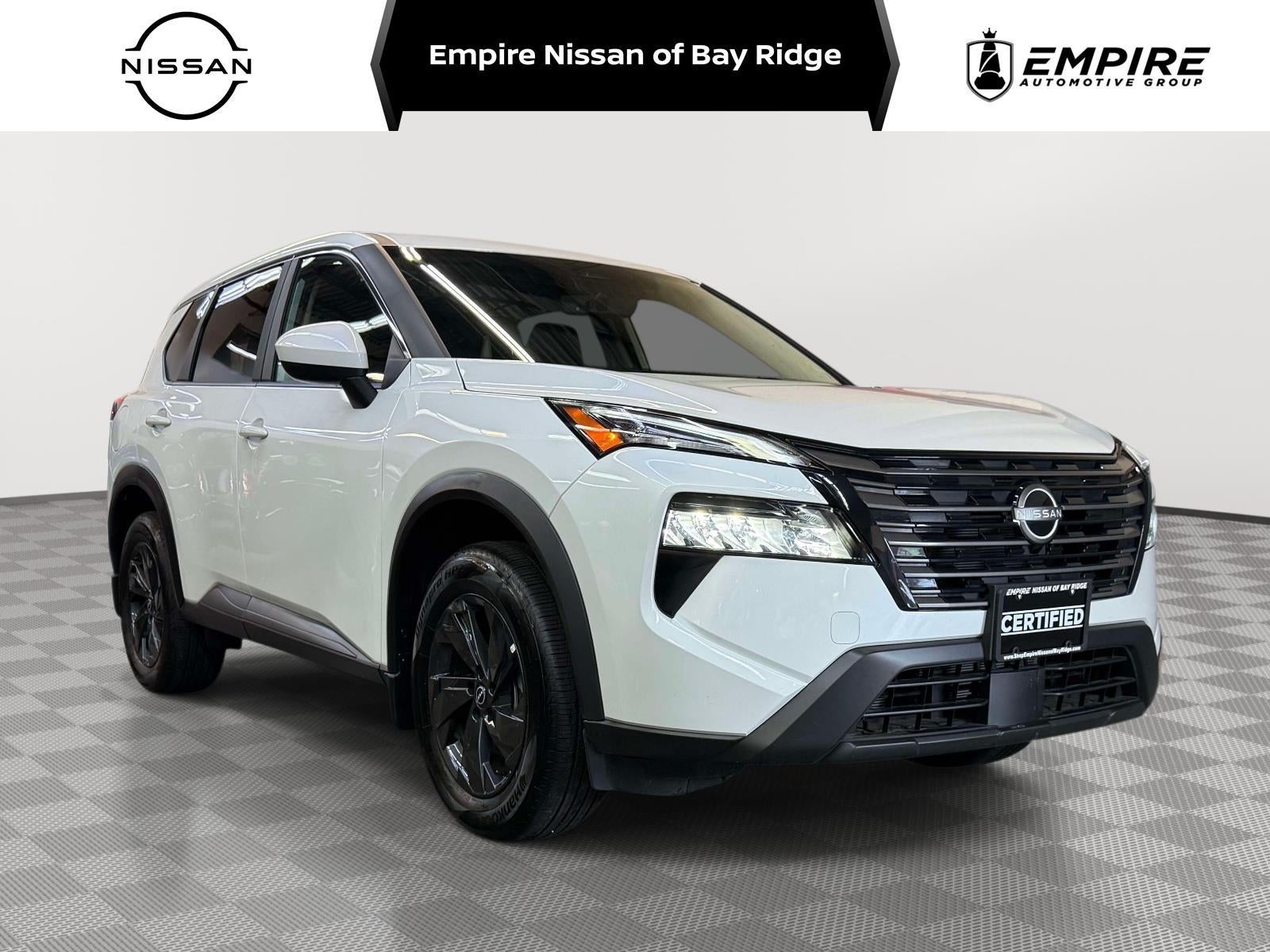 2026 Nissan Rogue SV in Everest White Pearl Tricoat — front three-quarter view