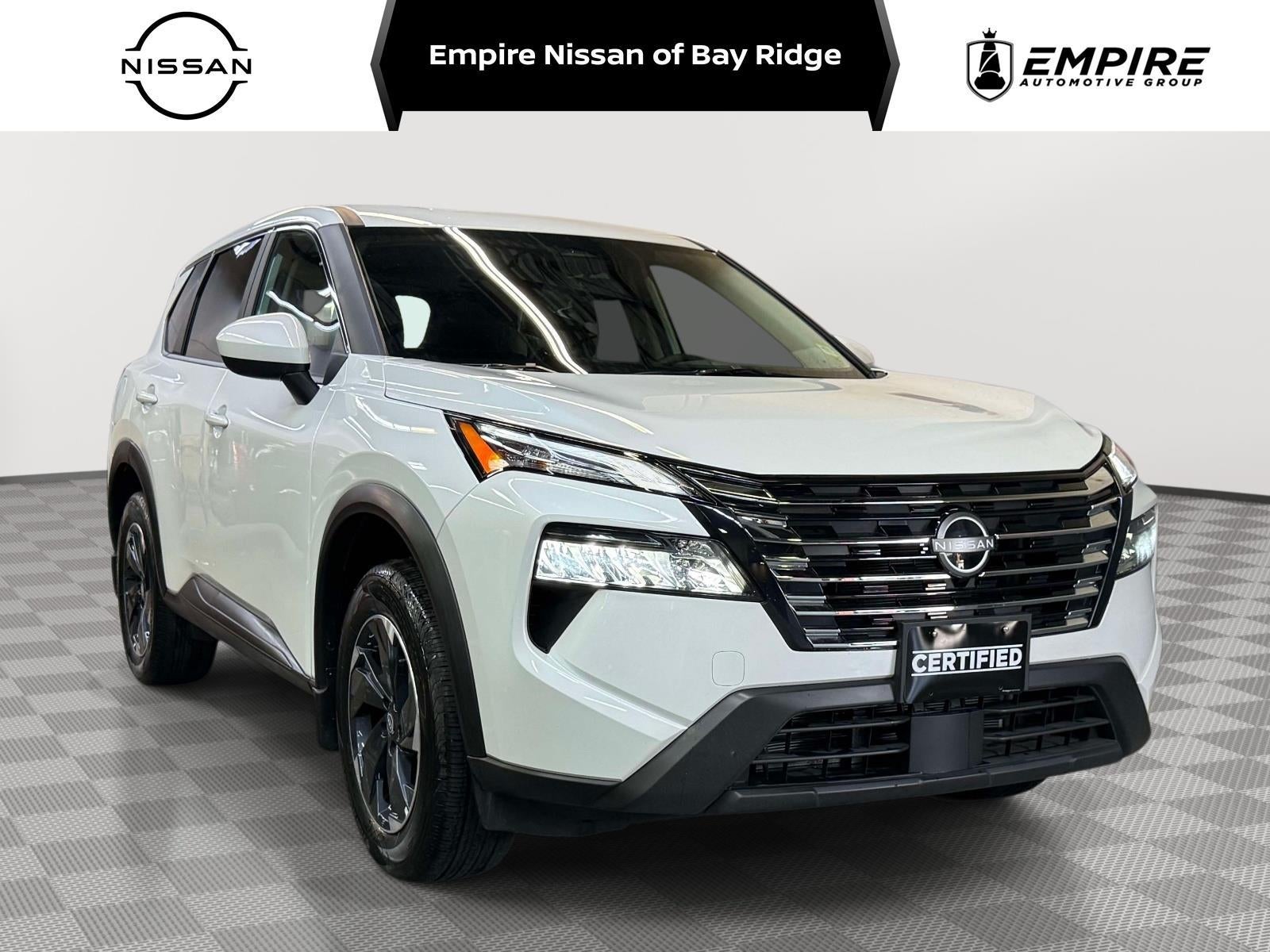 2026 Nissan Rogue SV in Everest White Pearl Tricoat — front three-quarter view