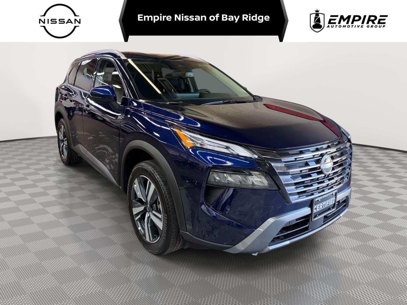 2026 Nissan Rogue SL in Deep Ocean Blue Pearl — front three-quarter view