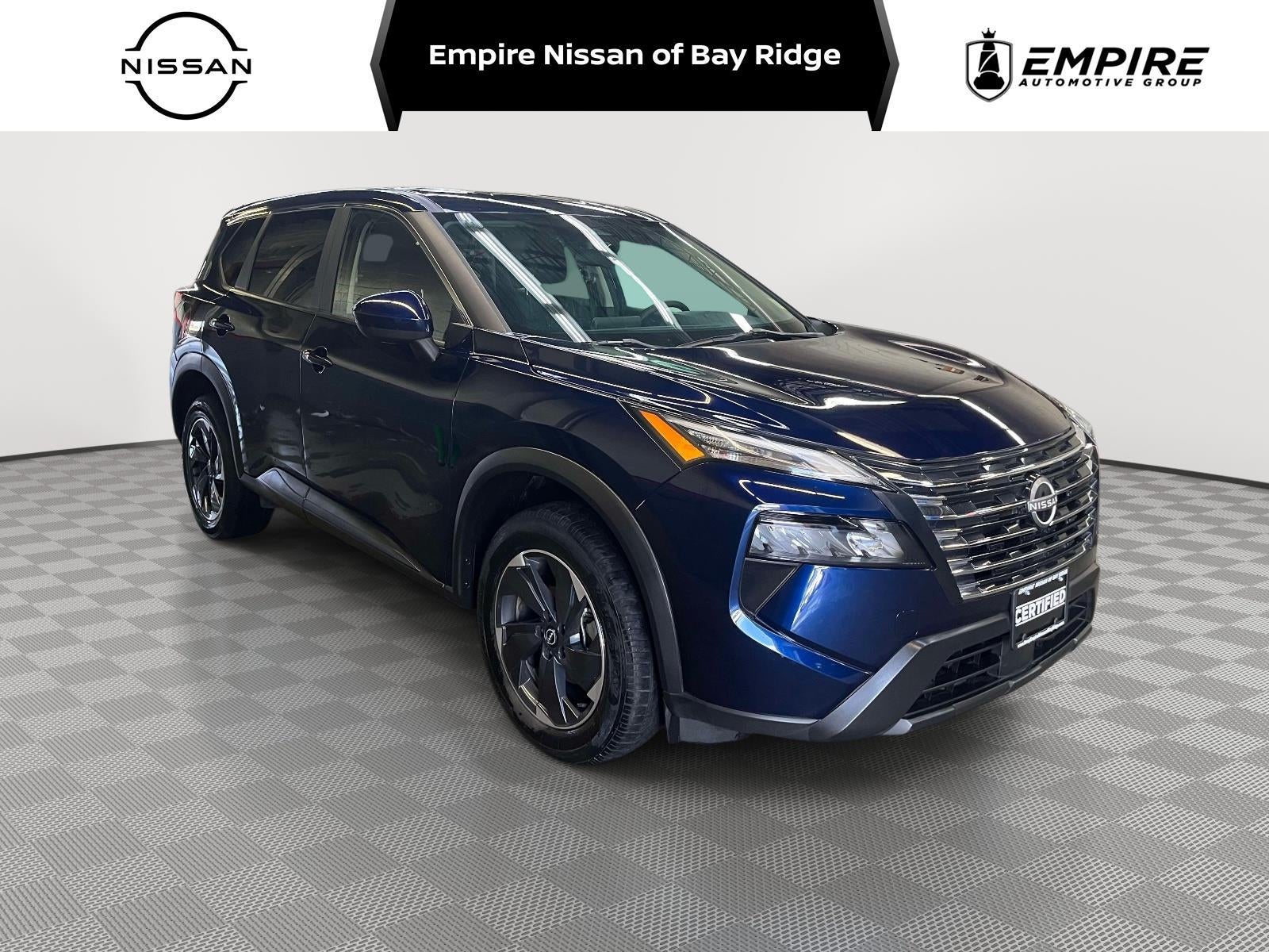 2023 Nissan Rogue SV Intelligent AWD in Caspian Blue Metallic — front three-quarter view