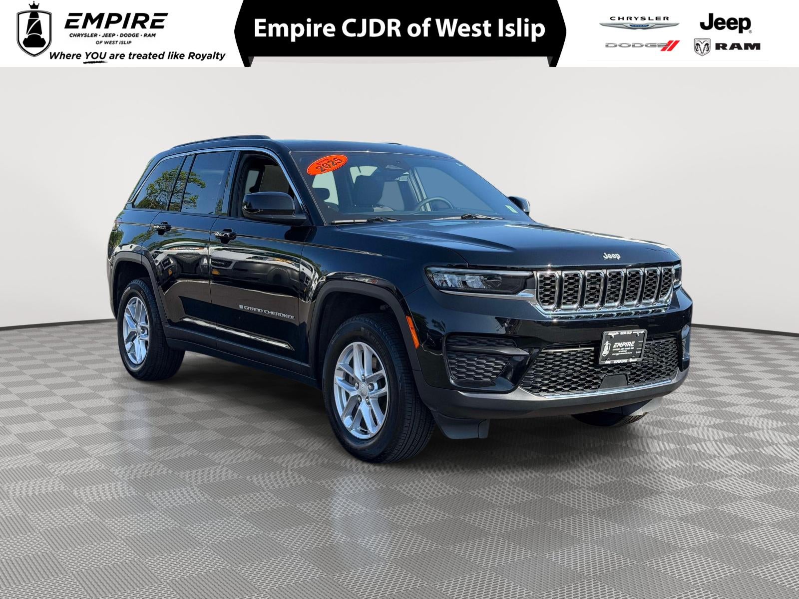 2025 Jeep Grand Cherokee Laredo X in Diamond Black Crystal Pearlcoat — front three-quarter view