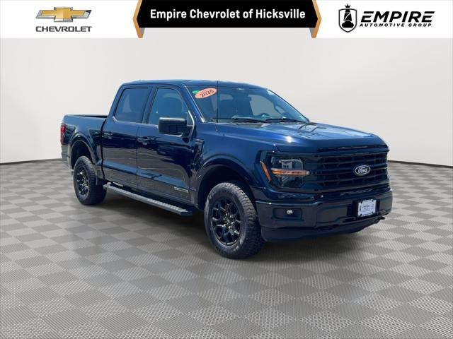 2025 Ford F-150 XLT in Antimatter Blue Metallic — front three-quarter view