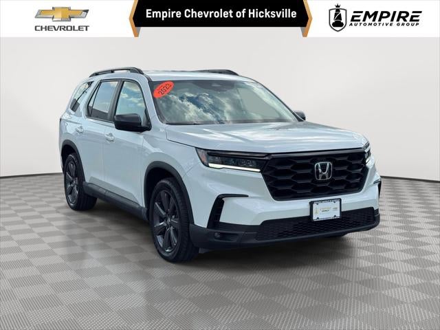 2023 Honda Pilot Sport in Platinum White Pearl — front three-quarter view