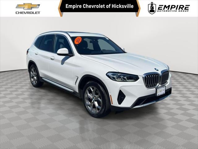 2023 BMW X3 xDrive30i in Alpine White — front three-quarter view