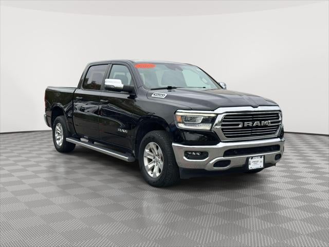 2024 RAM 1500 Laramie in Diamond Black Crystal Pearlcoat — front three-quarter view