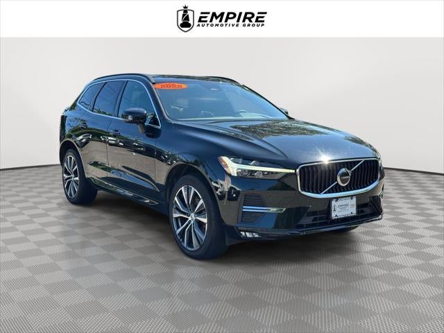 2022 Volvo XC60 Momentum in Onyx Black Metallic — front three-quarter view
