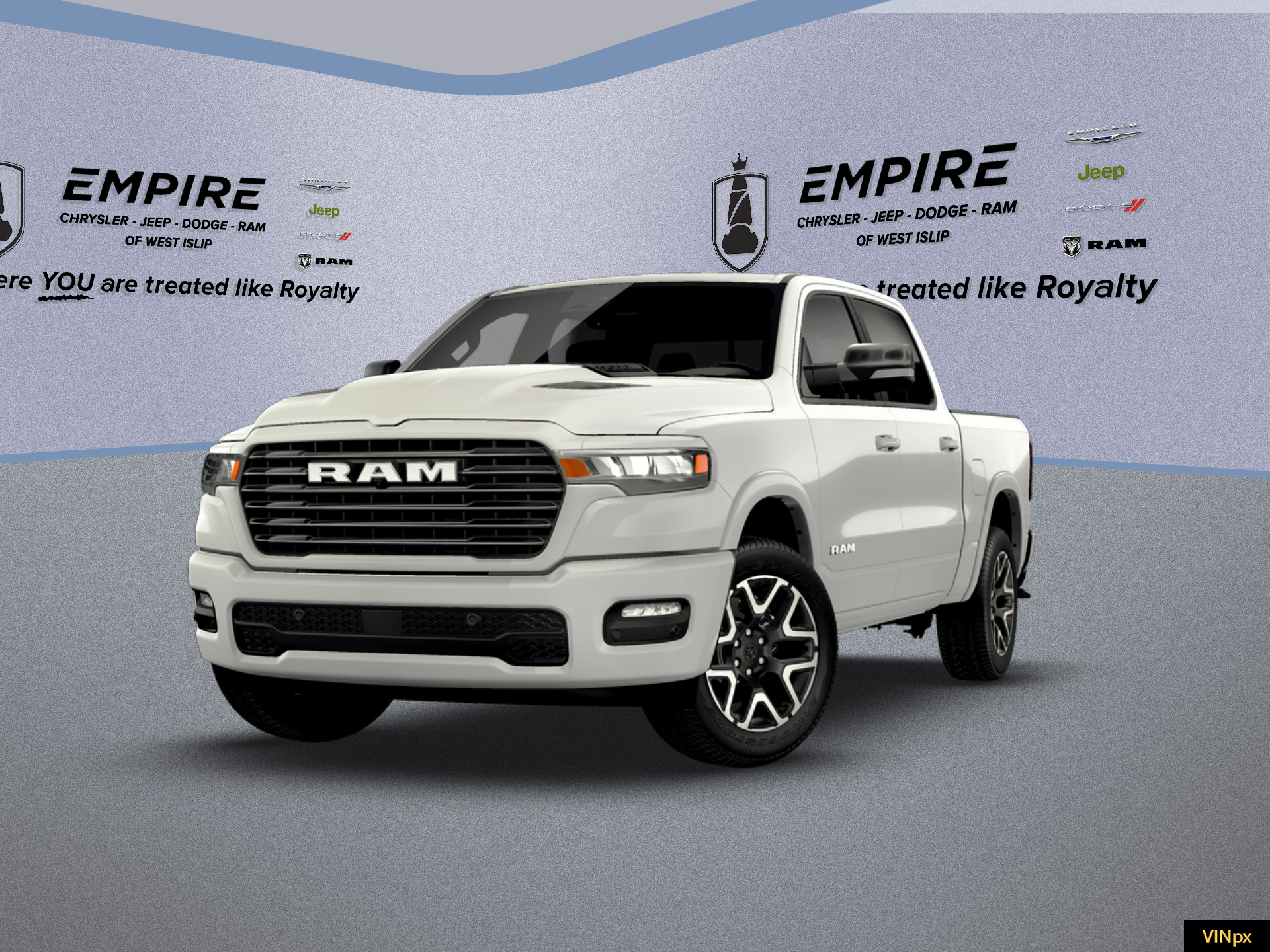 2026 RAM Ram 1500 RAM 1500 LARAMIE CREW CAB 4X4 5'7' BOX in Bright White Clear-Coat Exterior Paint — front three-quarter view