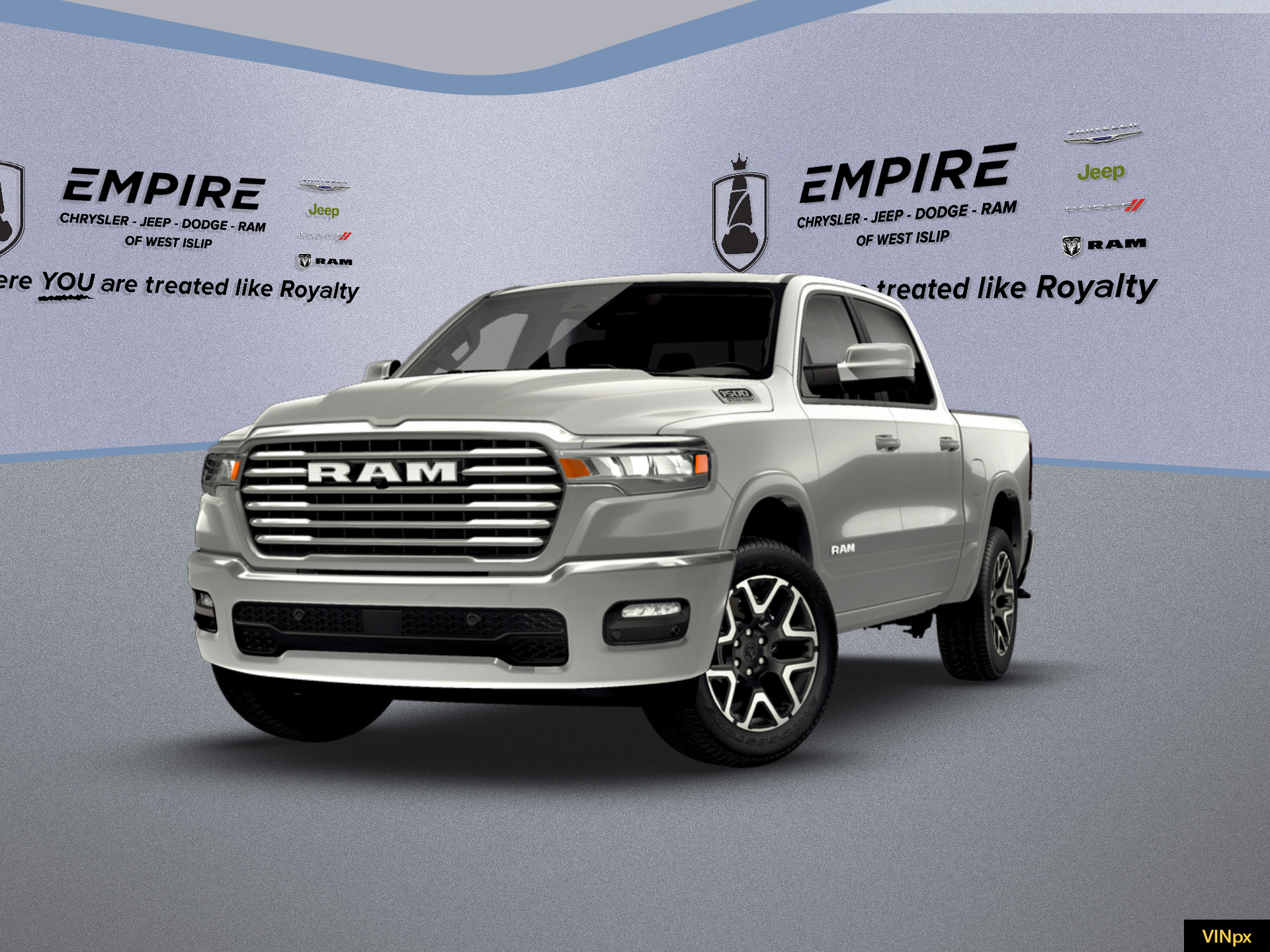 2026 RAM Ram 1500 RAM 1500 LARAMIE CREW CAB 4X4 5'7' BOX in Silver Zynith Exterior Paint — front three-quarter view