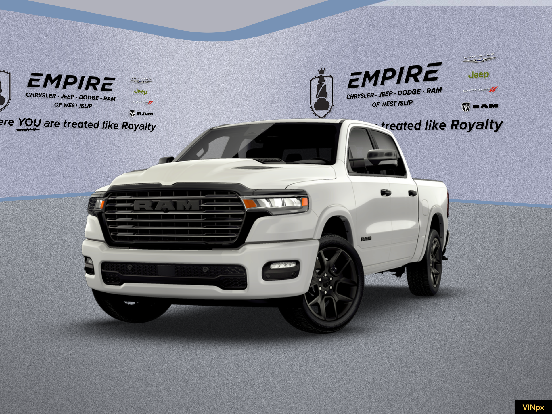 2026 RAM Ram 1500 RAM 1500 LARAMIE CREW CAB 4X4 5'7' BOX in Bright White Clear-Coat Exterior Paint — front three-quarter view