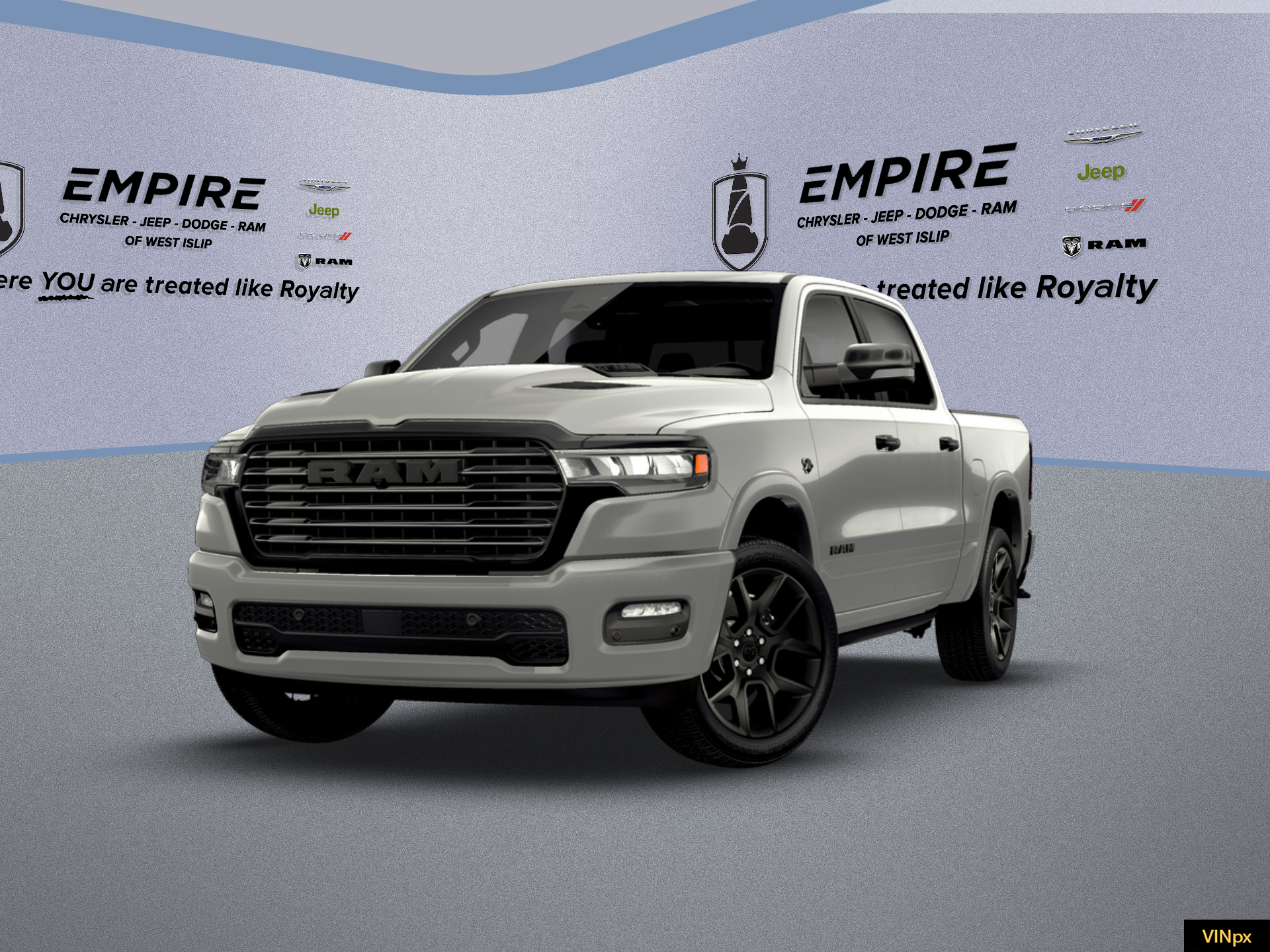 2026 RAM Ram 1500 RAM 1500 LARAMIE CREW CAB 4X4 5'7' BOX in Silver Zynith Exterior Paint — front three-quarter view