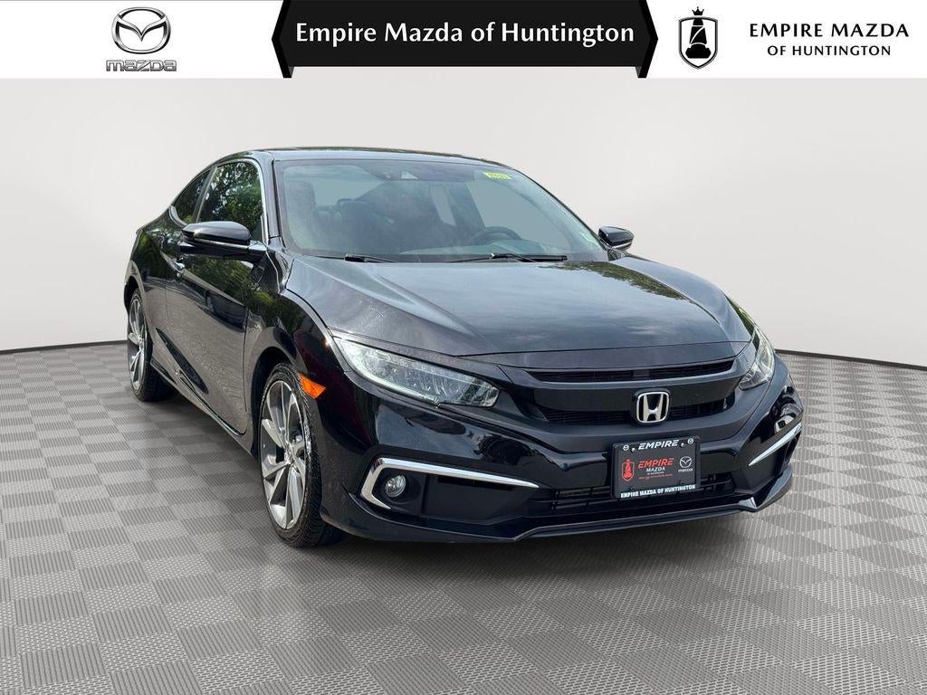 2020 Honda Civic Touring in Crystal Black Pearl — front three-quarter view