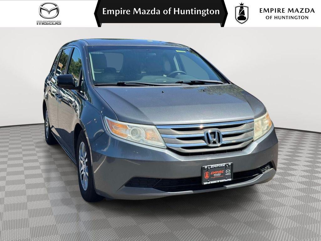 2013 Honda Odyssey EX in Polished Metal Metallic — front three-quarter view